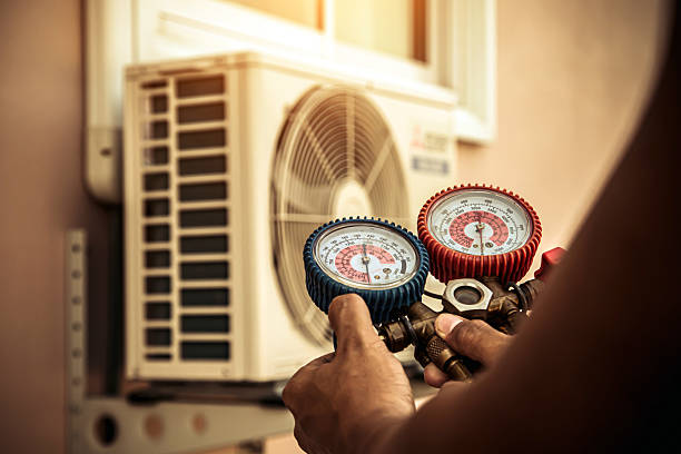Professional Hvac technician working in Somerset, MA
